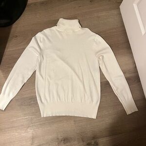 Basic white turtleneck sweater, light and breathable fabric, no tears or stains